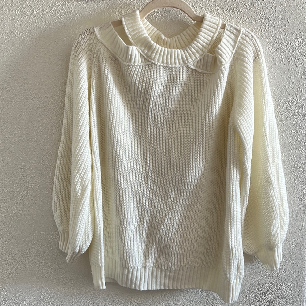 Cold shoulder sweater top with keyhole opening in the back